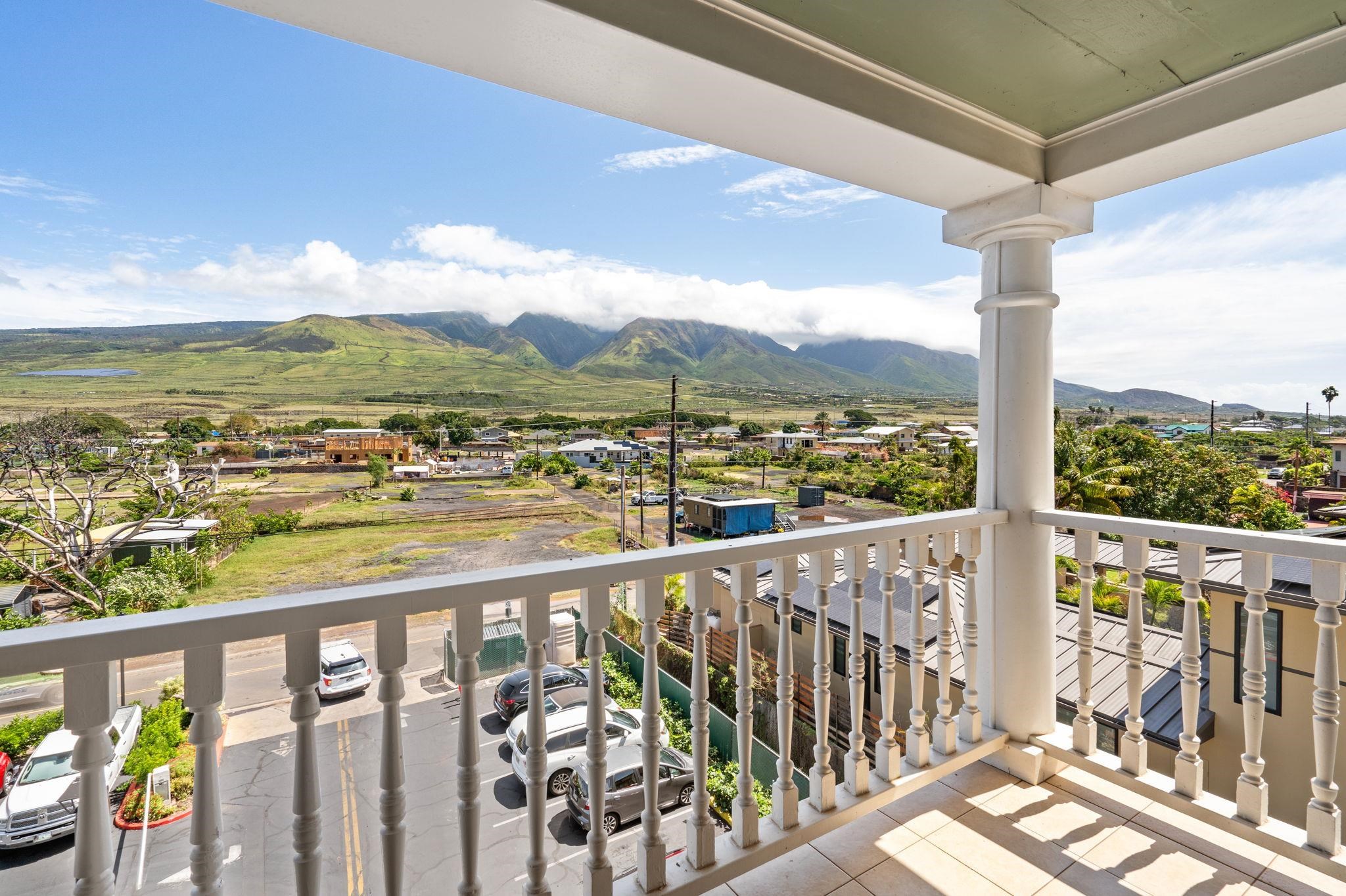 475 Front Street, Unit 402 Lahaina, HI 96761 - Photo 7 of 34 a view of city and mountain from a balcony
