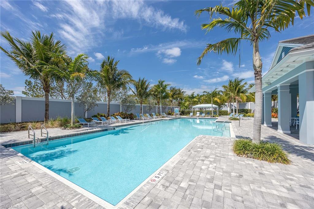 2603 Seychelles Circle, Unit 1505 Naples, FL 34112 - Photo 27 of 35 a view of a backyard with swimming pool