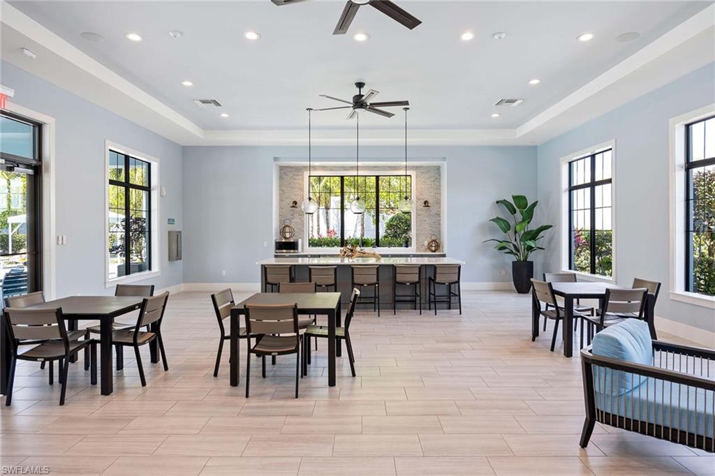 2603 Seychelles Circle, Unit 1505 Naples, FL 34112 - Photo 31 of 35 a view of a a dining room with furniture window and outside view