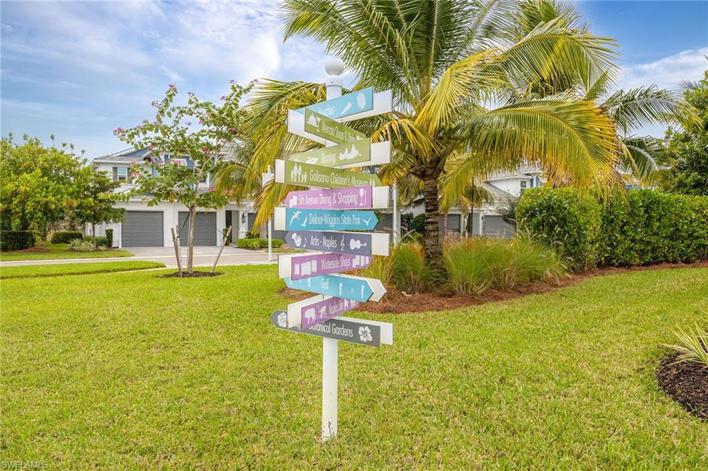 2603 Seychelles Circle, Unit 1505 Naples, FL 34112 - Photo 35 of 35 a swimming pool with outdoor seating and yard