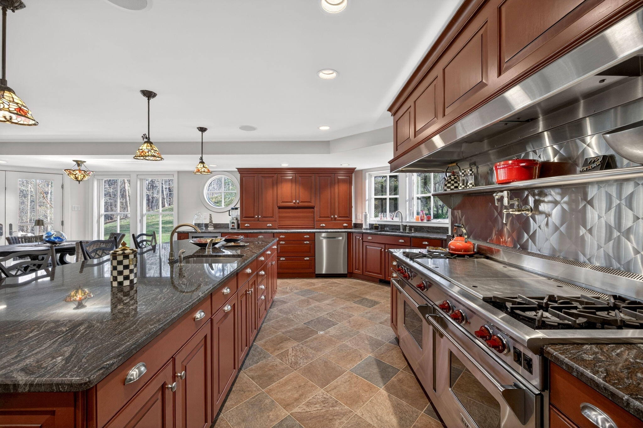 35 Northgate Road North Chatham, MA 02650 - Photo 18 of 75 a kitchen with stainless steel appliances granite countertop a stove a sink and a refrigerator