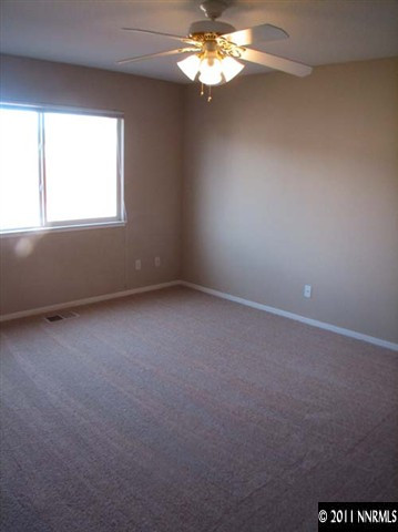 17543 Javalina Court Reno, NV 89508 - Photo 8 of 13 an empty room with a window