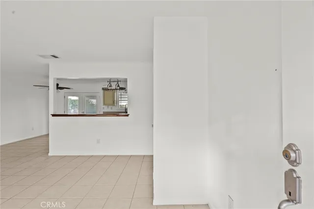 a view of kitchen and front door