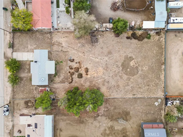 an aerial view of residential house with outdoor space