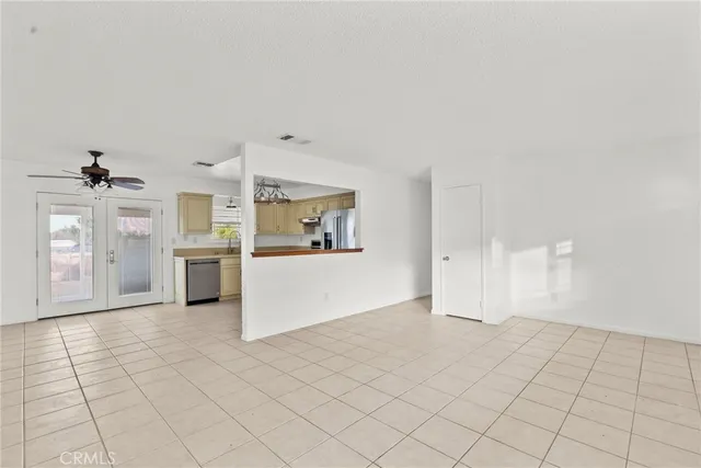 a view of a kitchen with a sink