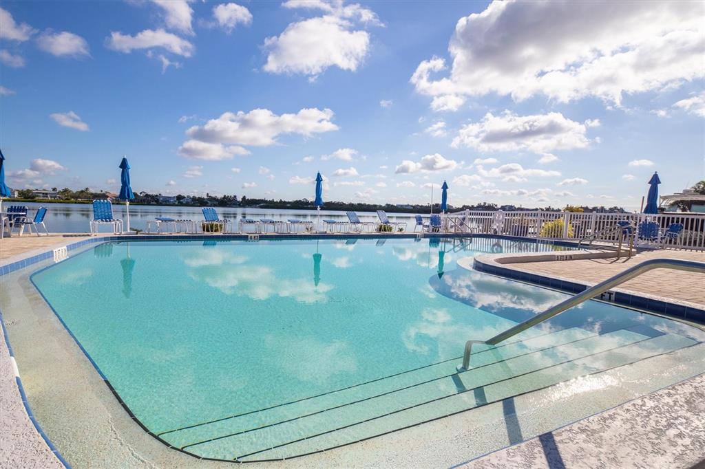 5911 Midnight Pass Road, Unit 206 Sarasota, FL 34242 - Photo 40 of 88 a view of a swimming pool