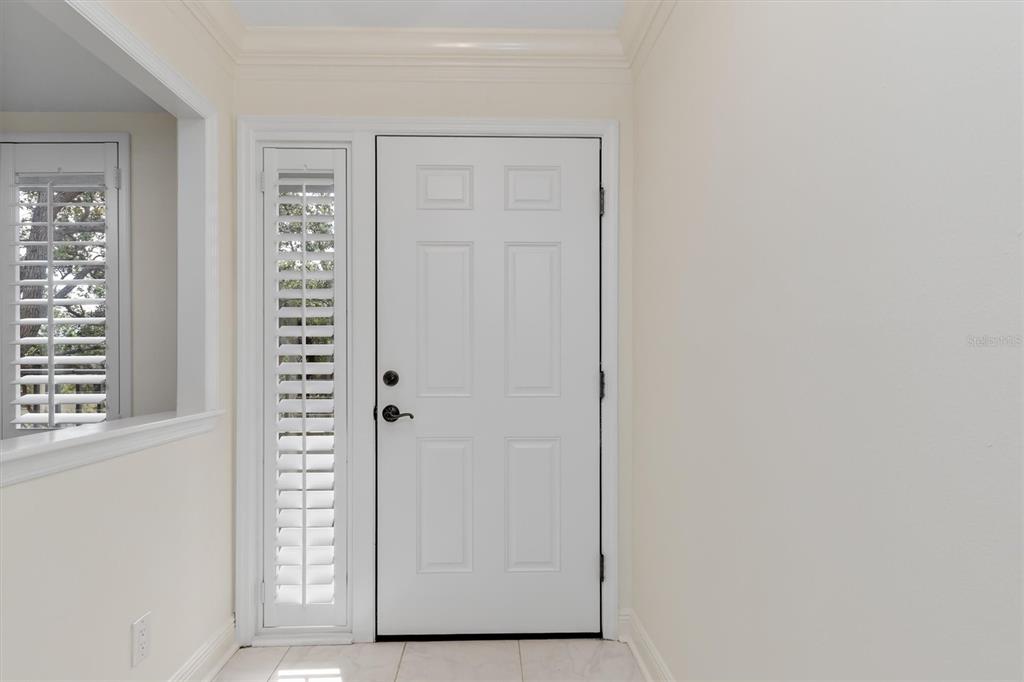 5911 Midnight Pass Road, Unit 206 Sarasota, FL 34242 - Photo 47 of 88 a view of a bathroom with a door