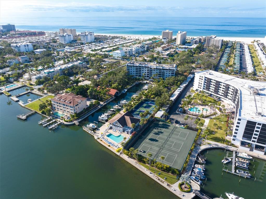 5911 Midnight Pass Road, Unit 206 Sarasota, FL 34242 - Photo 49 of 88 an aerial view of a house with a lake view