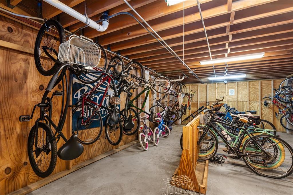 5911 Midnight Pass Road, Unit 206 Sarasota, FL 34242 - Photo 53 of 88 a view of a room with gym equipment