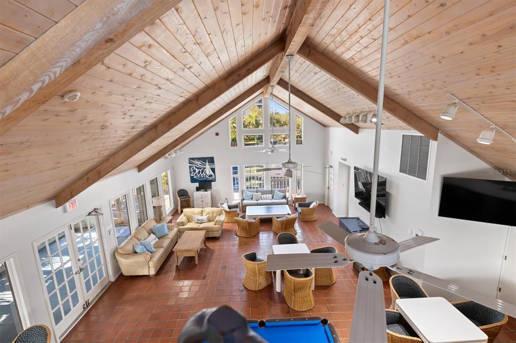 5911 Midnight Pass Road, Unit 206 Sarasota, FL 34242 - Photo 61 of 88 a very nice looking living room with a large window