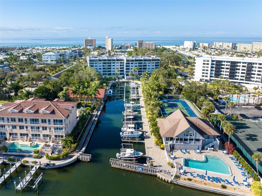 5911 Midnight Pass Road, Unit 206 Sarasota, FL 34242 - Photo 87 of 88 a view of a city with tall buildings