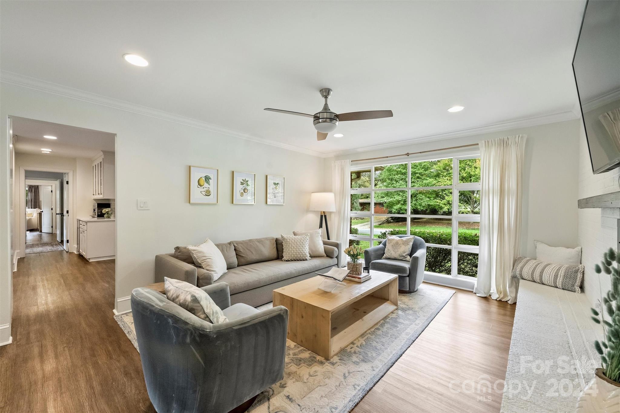5501 Seacroft Road Charlotte, NC 28210 - Photo 18 of 37 a living room with furniture and a large window