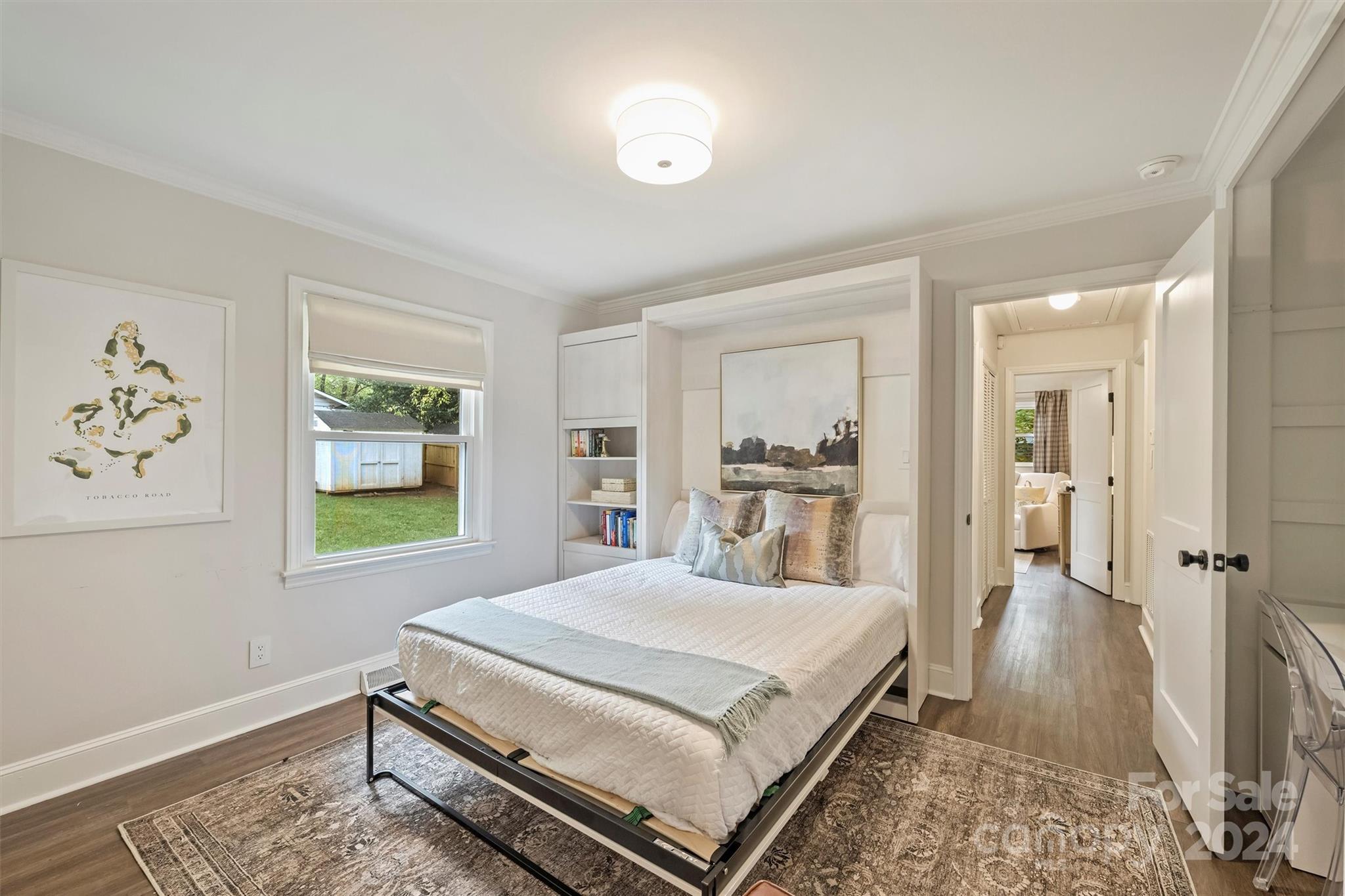 5501 Seacroft Road Charlotte, NC 28210 - Photo 21 of 37 a spacious bedroom with a bed and a window