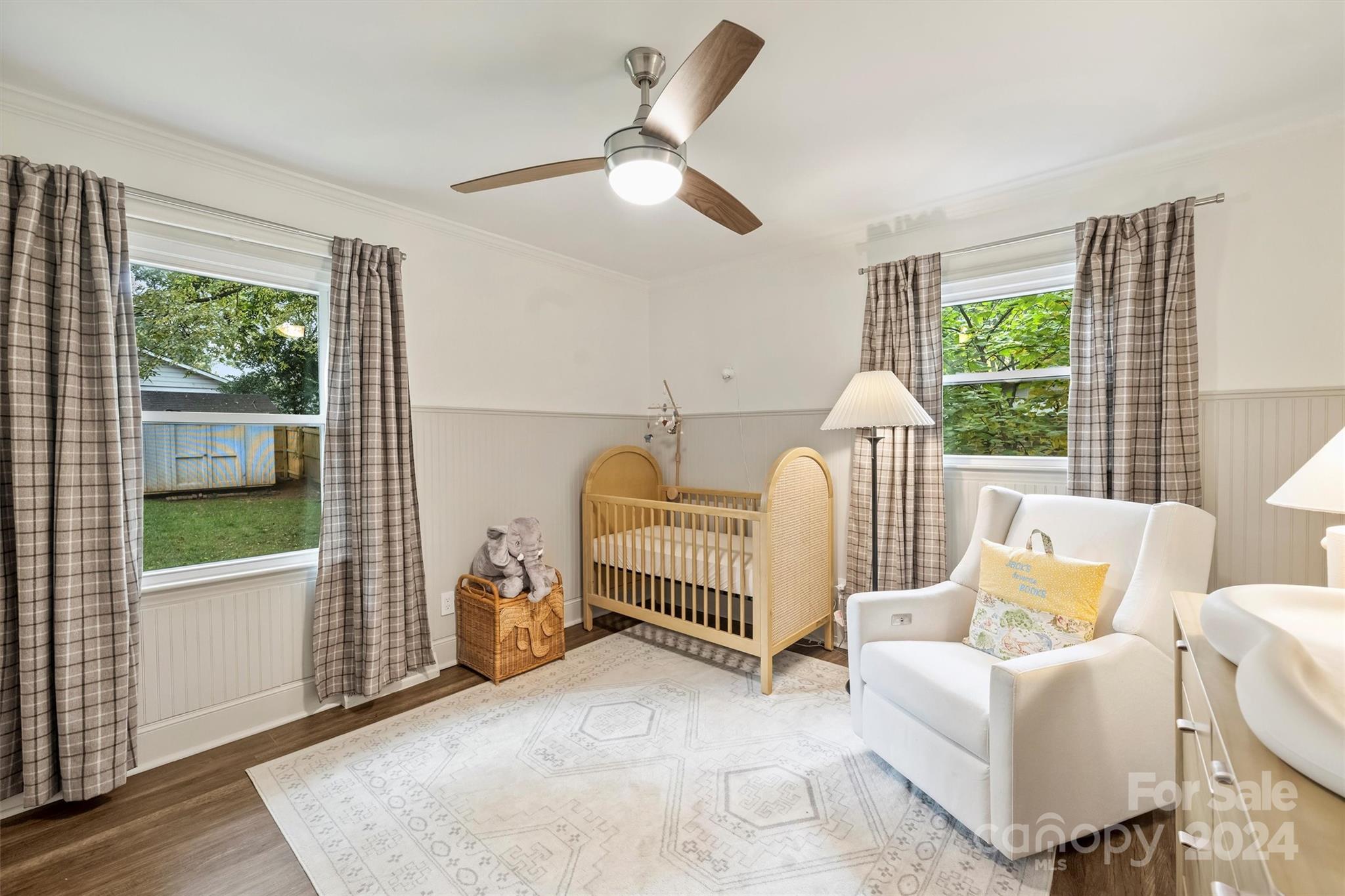 5501 Seacroft Road Charlotte, NC 28210 - Photo 26 of 37 a living room with furniture and a floor to ceiling window