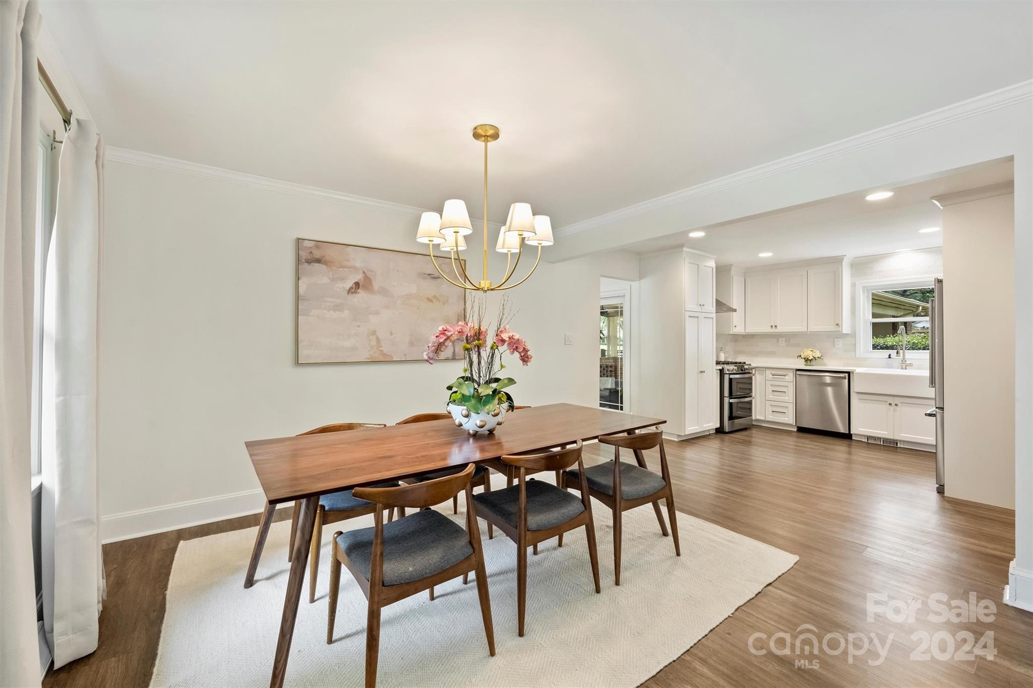 5501 Seacroft Road Charlotte, NC 28210 - Photo 8 of 37 a view of a dining room with furniture and wooden floor