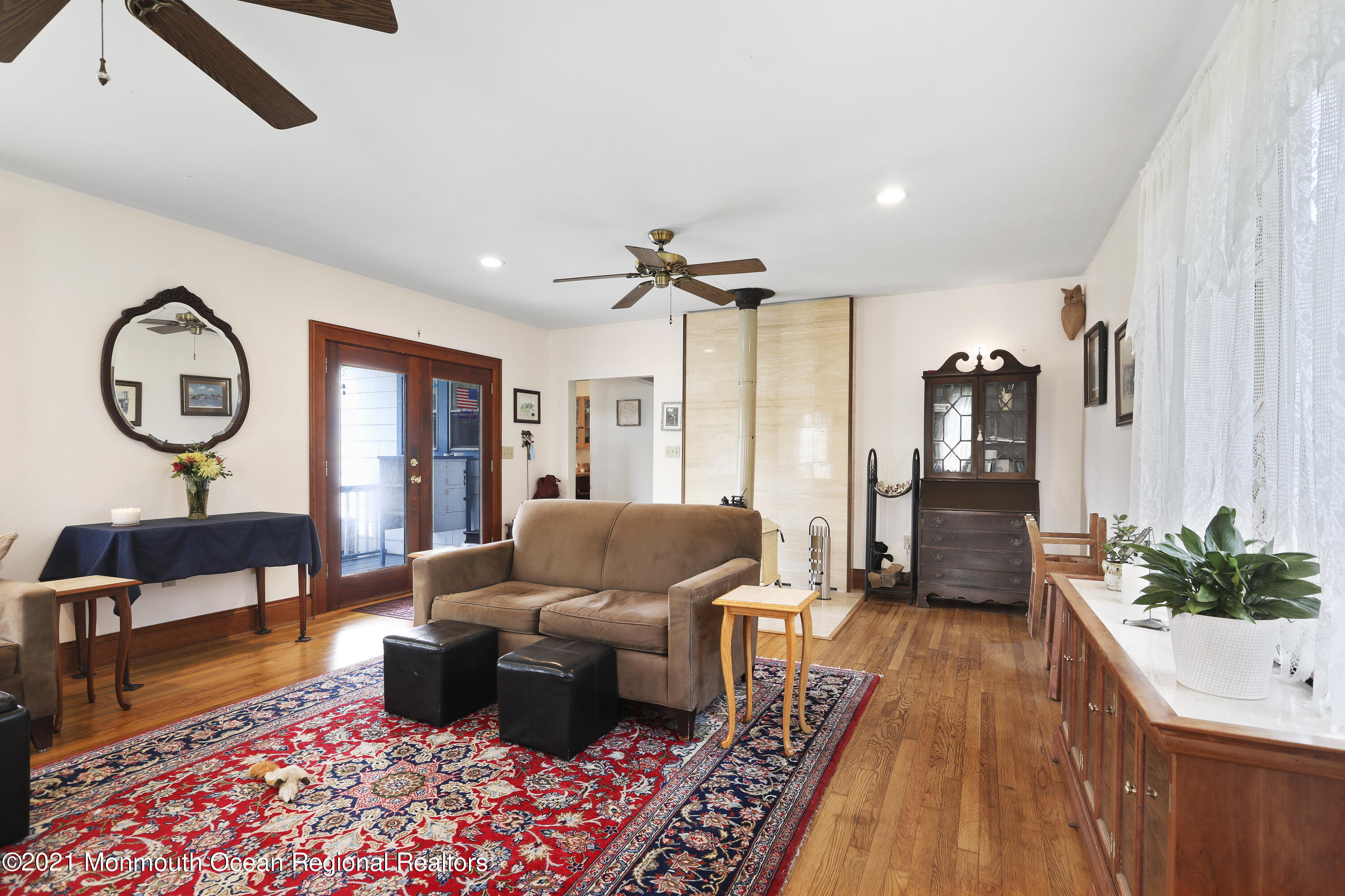 194 Lanes Mill Road Howell, NJ 07731 - Photo 14 of 35 a living room with furniture and a large window