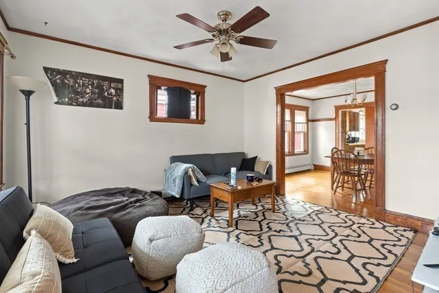 a living room with furniture and a table