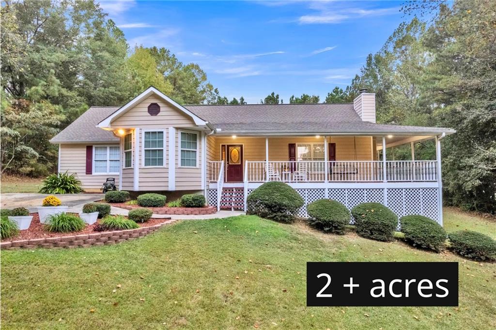 a view of a house with a garden