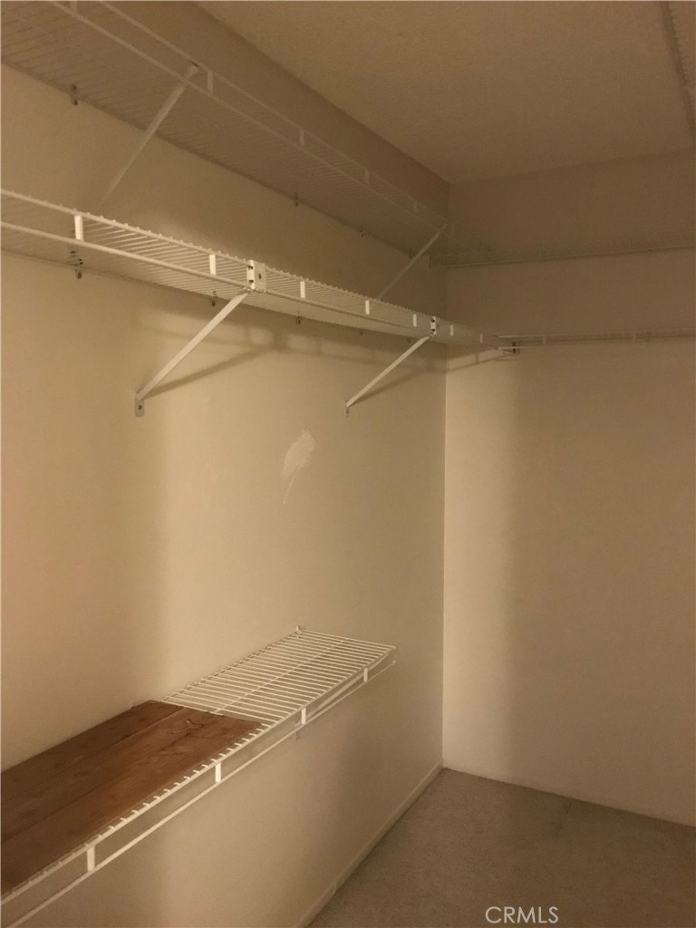 1203 Edgewood Lane Upland, CA 91786 - Photo 9 of 11 a view of a room with racks on the wall