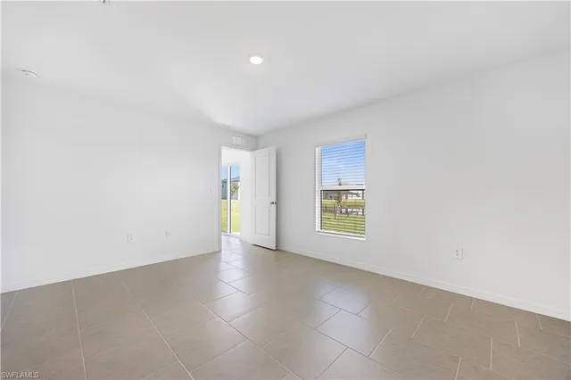 a bathroom with a toilet a sink and a mirror