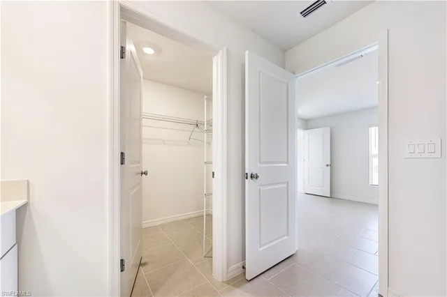 a view of a room with racks on the wall