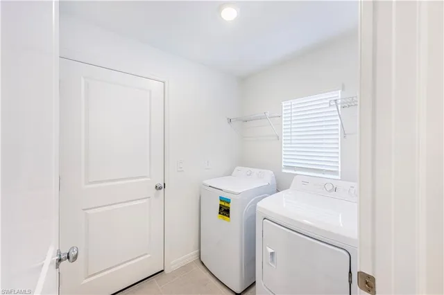 a view of a lake with houses in the back