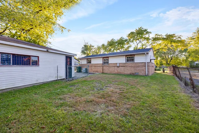 a view of a backyard with a garden