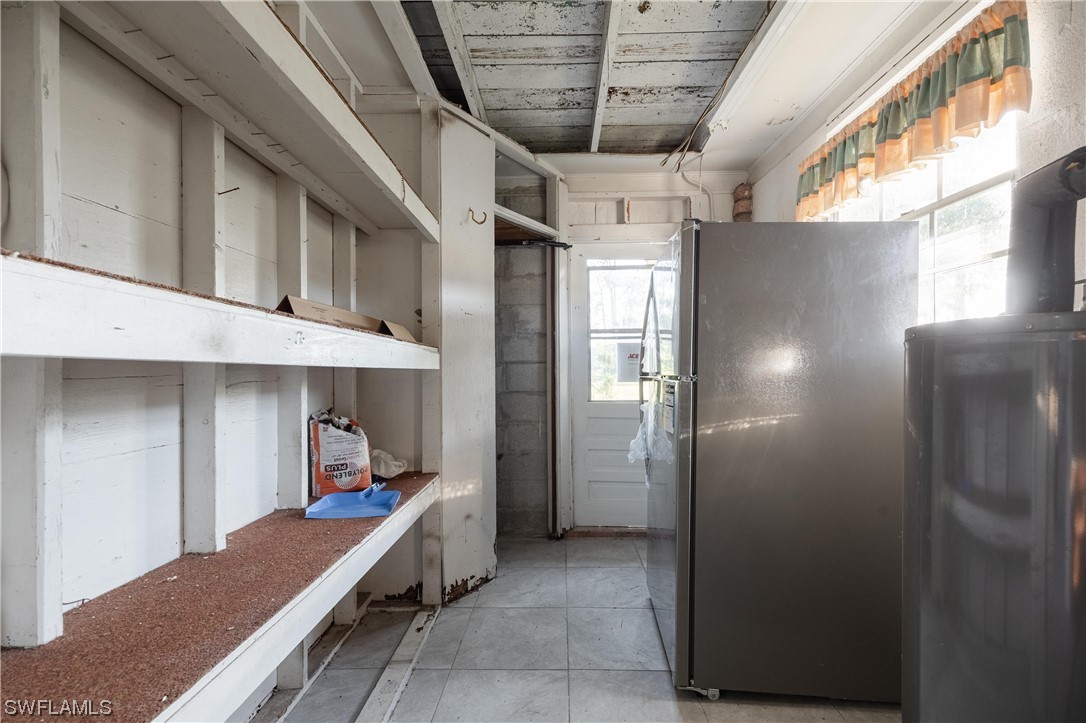 1338 Old Bridge Road North Fort Myers, FL 33917 - Photo 28 of 33 a room with storage and utility