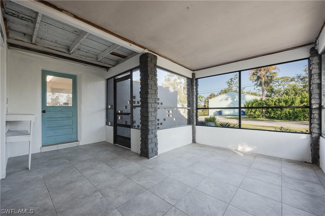 1338 Old Bridge Road North Fort Myers, FL 33917 - Photo 30 of 33 a view of an empty room with a balcony