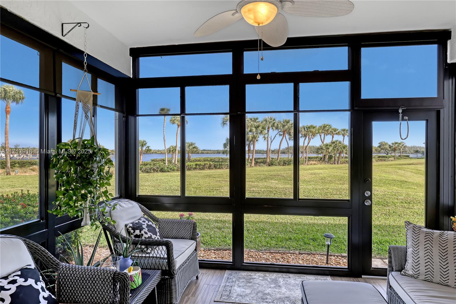 6102 Southeast Landing Way, Unit 2 Stuart, FL 34997 - Photo 24 of 44 a outdoor living space with furniture