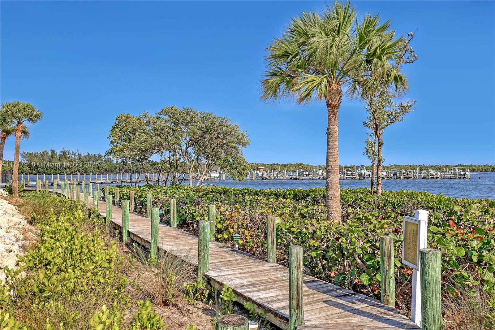 6102 Southeast Landing Way, Unit 2 Stuart, FL 34997 - Photo 35 of 44 a view of a balcony with lake view