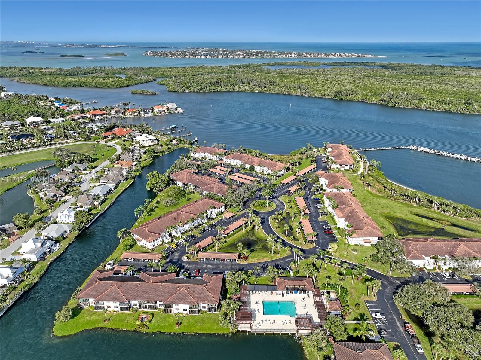 6102 Southeast Landing Way, Unit 2 Stuart, FL 34997 - Photo 36 of 44 an aerial view of a city
