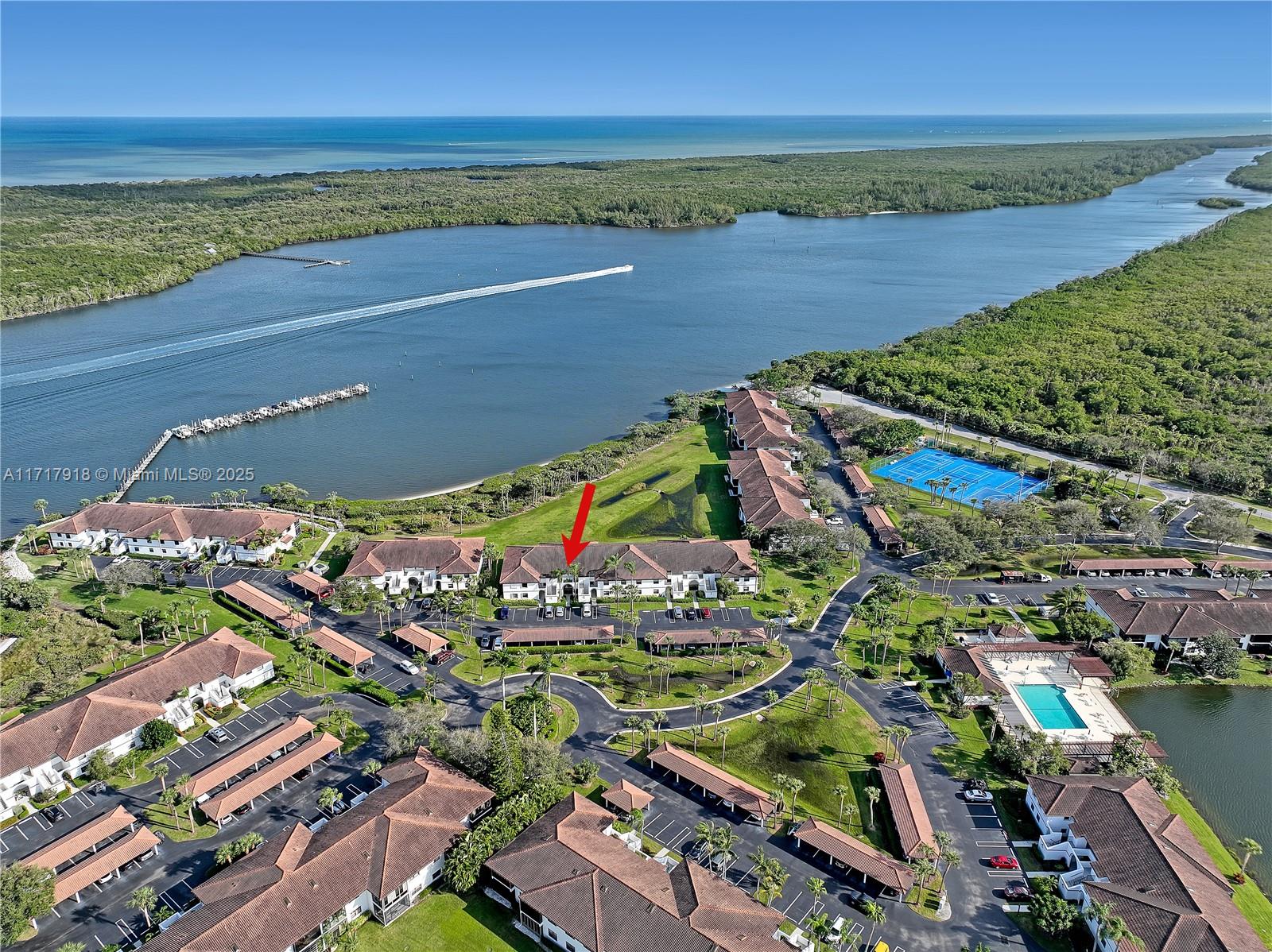 6102 Southeast Landing Way, Unit 2 Stuart, FL 34997 - Photo 40 of 44 an aerial view of a city
