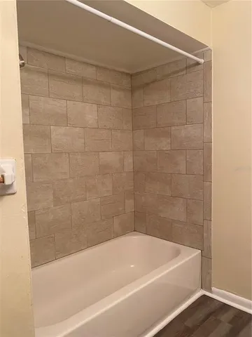 a bathroom with a bathtub