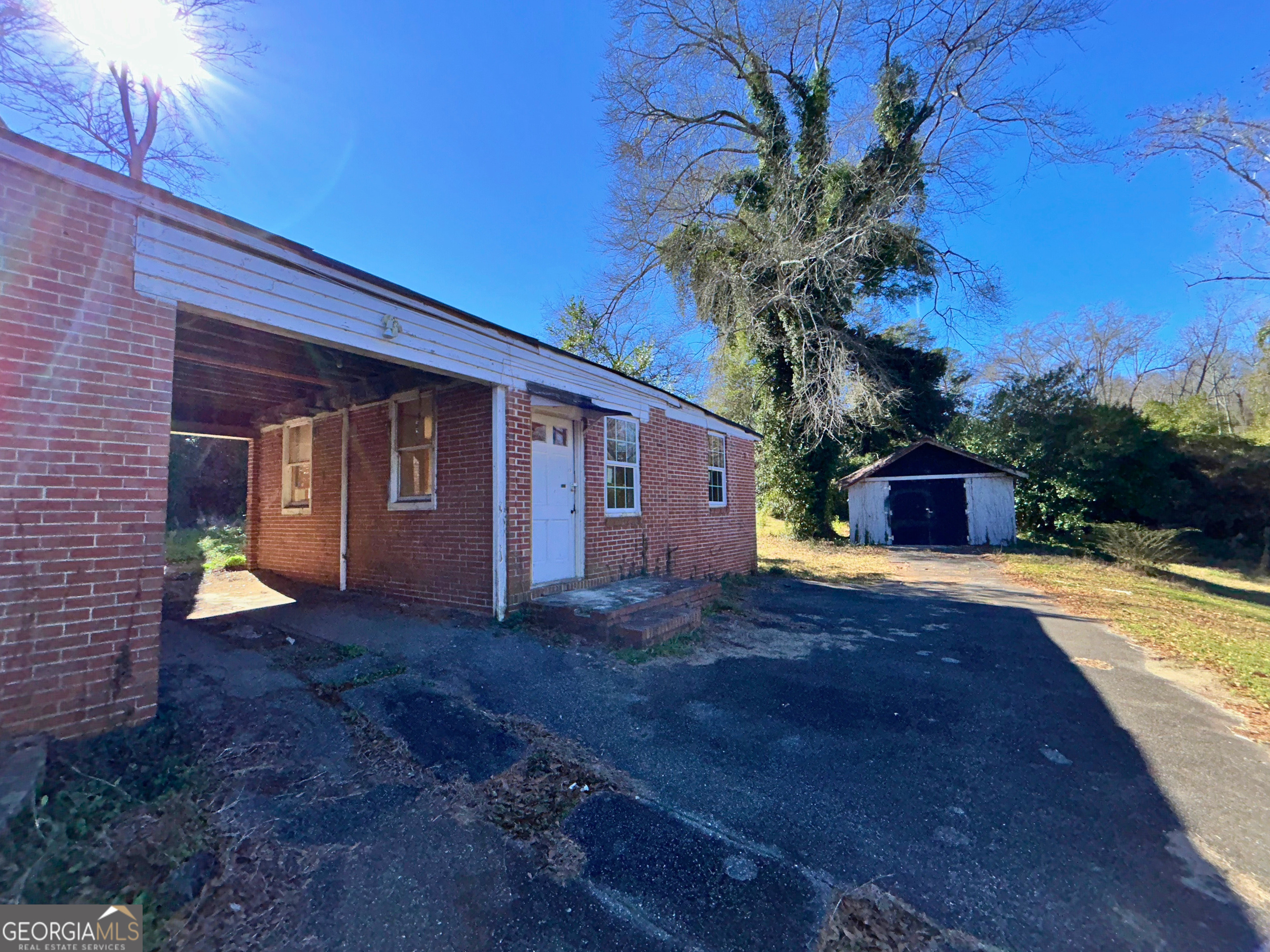 806 Magnolia Drive Macon, GA 31217 - Photo 3 of 25 a view of a house with a yard
