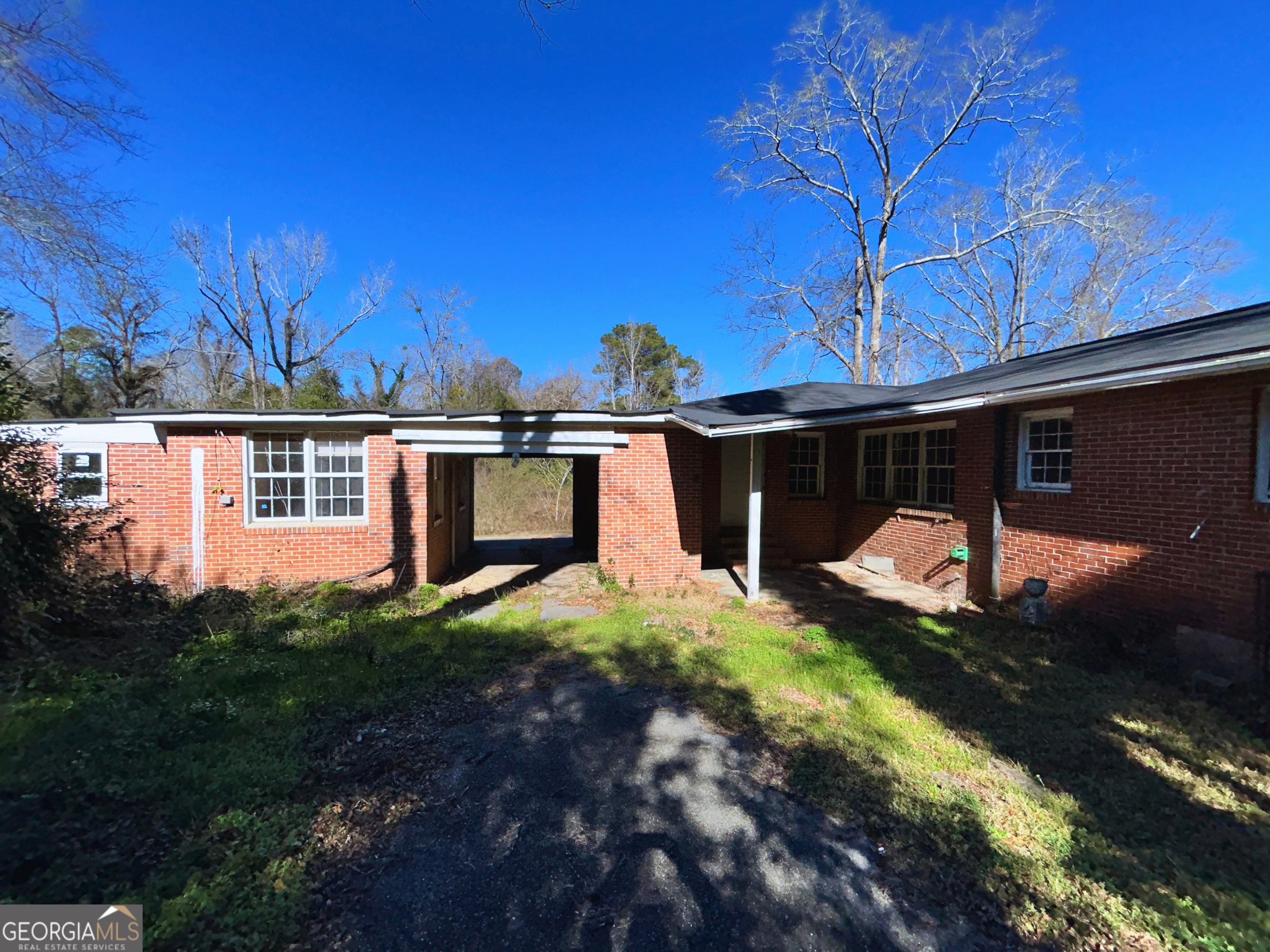 806 Magnolia Drive Macon, GA 31217 - Photo 7 of 25 a view of a house with backyard and garden