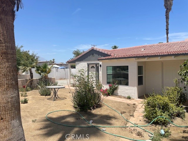 a view of a house with sitting area