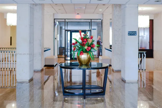 a view of a swimming pool with lounge chairs