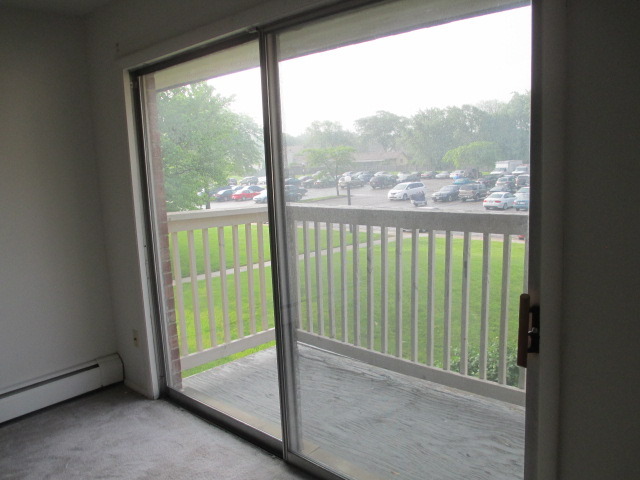918 Ridge Square, Unit 205 Elk Grove Village, IL 60007 - Photo 3 of 7 a view of a room with window