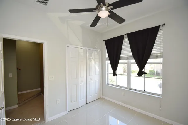 a view of a hallway with a white walls
