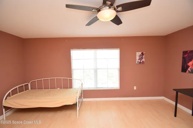 a swimming pool with outdoor seating and yard