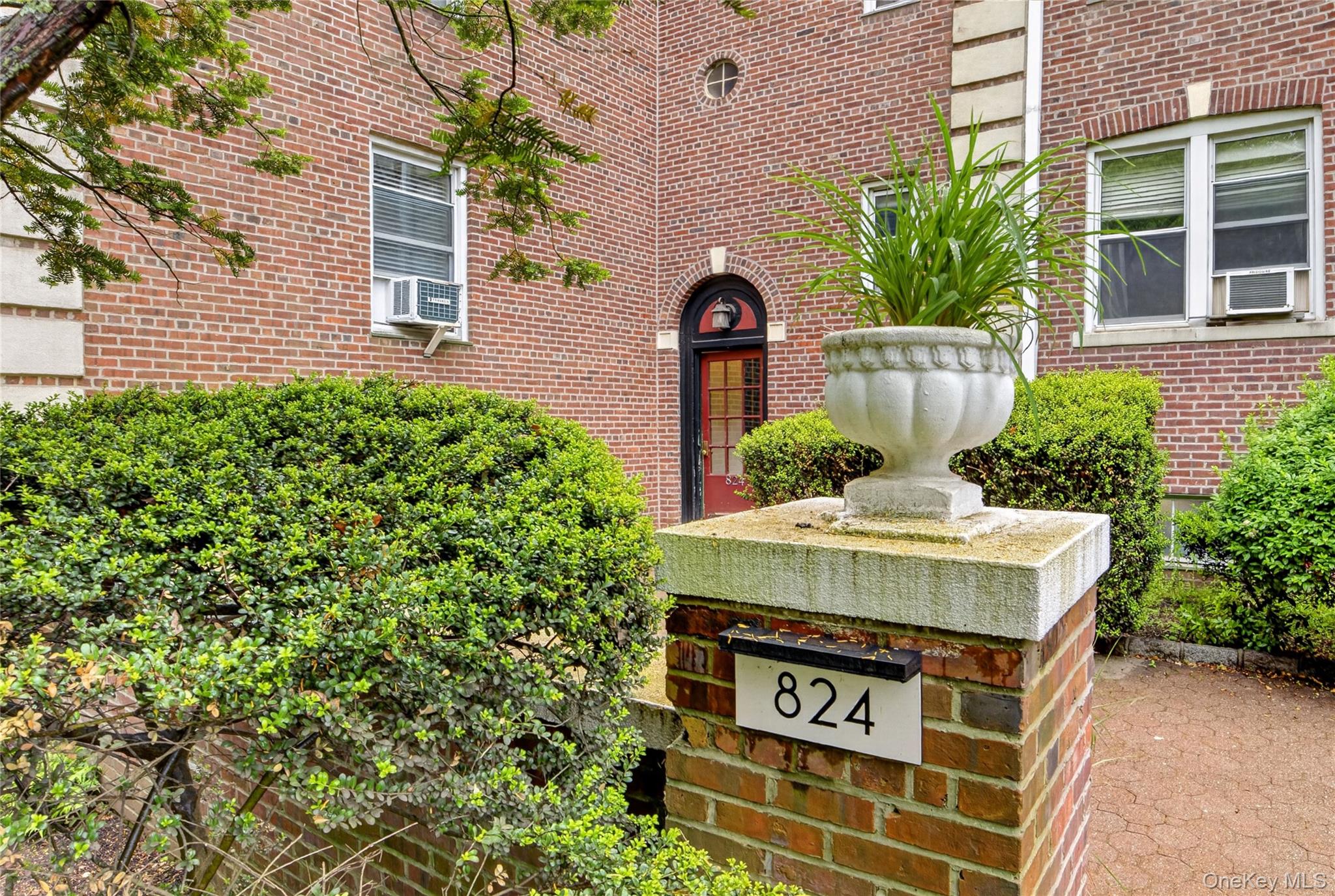 824 Palmer Road, Unit 1F Bronxville, NY 10708 - Photo 2 of 26 a view of house with outdoor space and entertaining space
