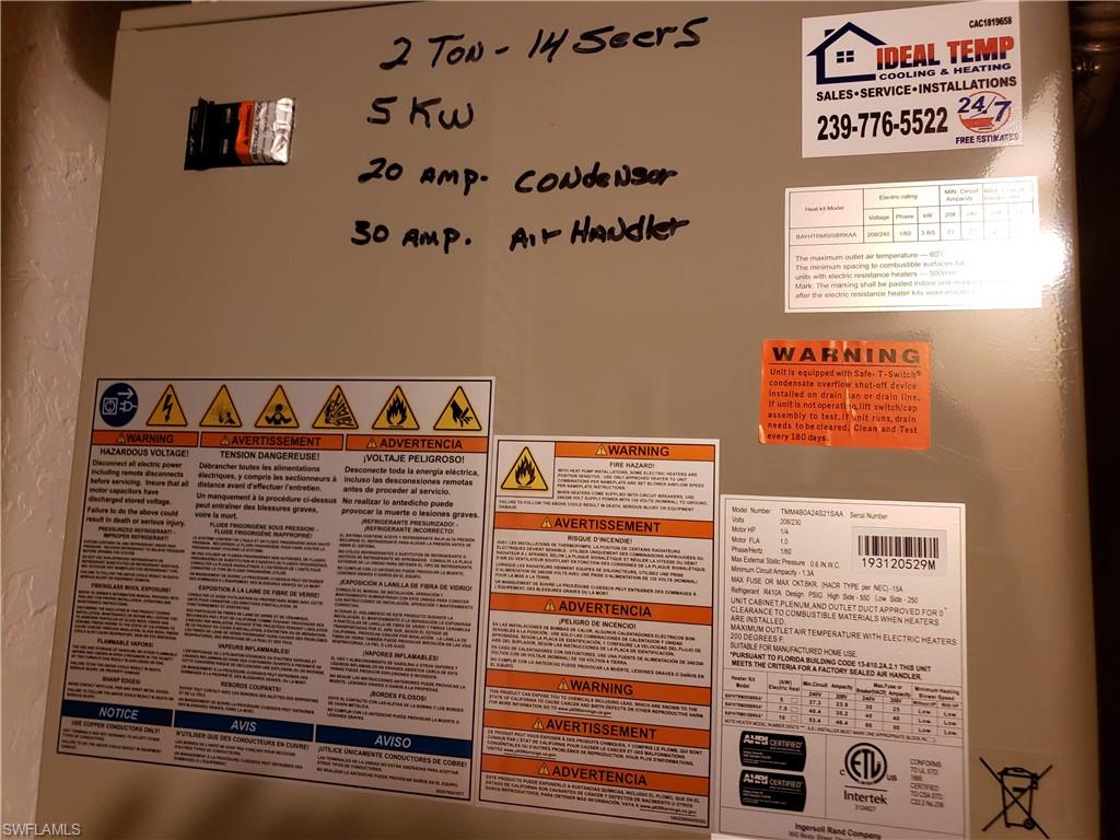 4031 Ice Castle Way, Unit 3303 Naples, FL 34112 - Photo 13 of 18 a view of a door with a book