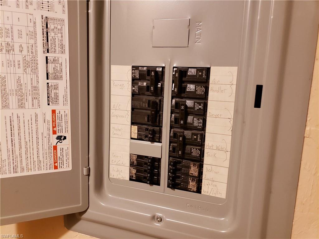 4031 Ice Castle Way, Unit 3303 Naples, FL 34112 - Photo 16 of 18 a close up of a white cabinet