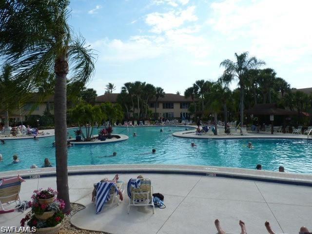 4031 Ice Castle Way, Unit 3303 Naples, FL 34112 - Photo 18 of 18 a view of a backyard