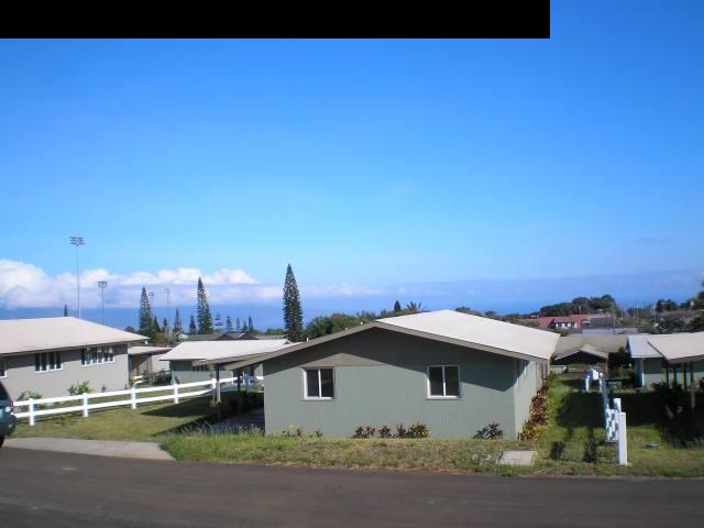 11 Maha Road, Unit 11 Makawao, HI 96768 - Photo 17 of 20 a front view of a house with a garden