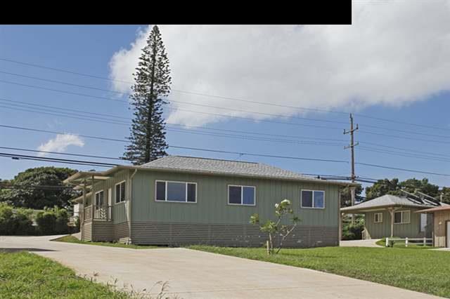 11 Maha Road, Unit 11 Makawao, HI 96768 - Photo 2 of 20 a front view of a house with garden