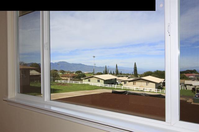 11 Maha Road, Unit 11 Makawao, HI 96768 - Photo 3 of 20 a view of a balcony with an ocean view