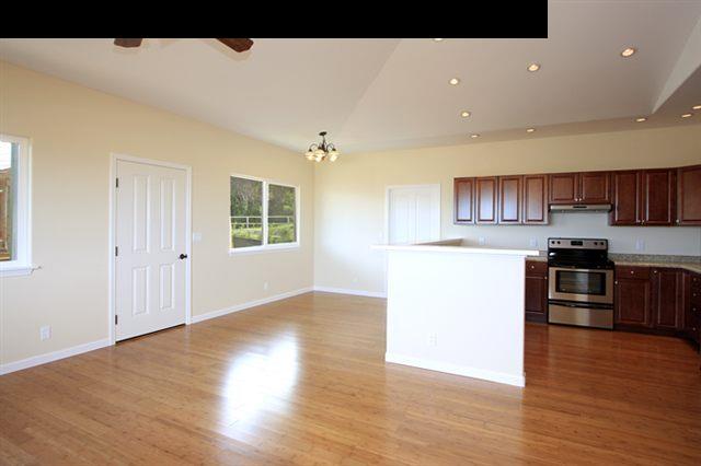 11 Maha Road, Unit 11 Makawao, HI 96768 - Photo 6 of 20 a view of kitchen with wooden floor