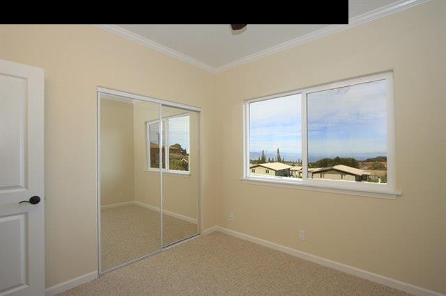 11 Maha Road, Unit 11 Makawao, HI 96768 - Photo 8 of 20 a view of an empty room with a window